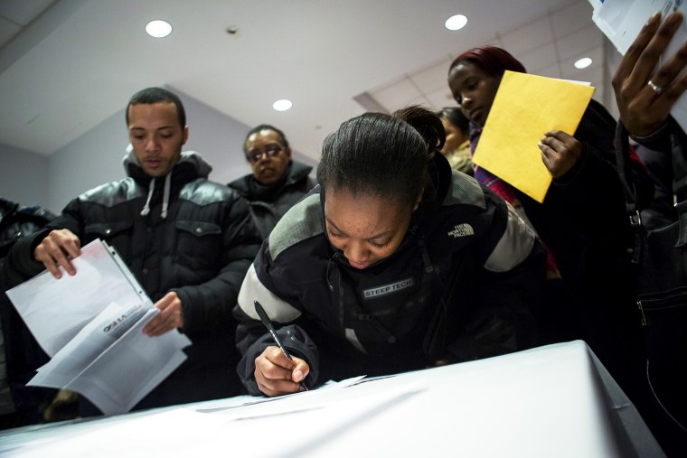 People attend a job training and resource fair at Coney Island in New York December 11, 2013.