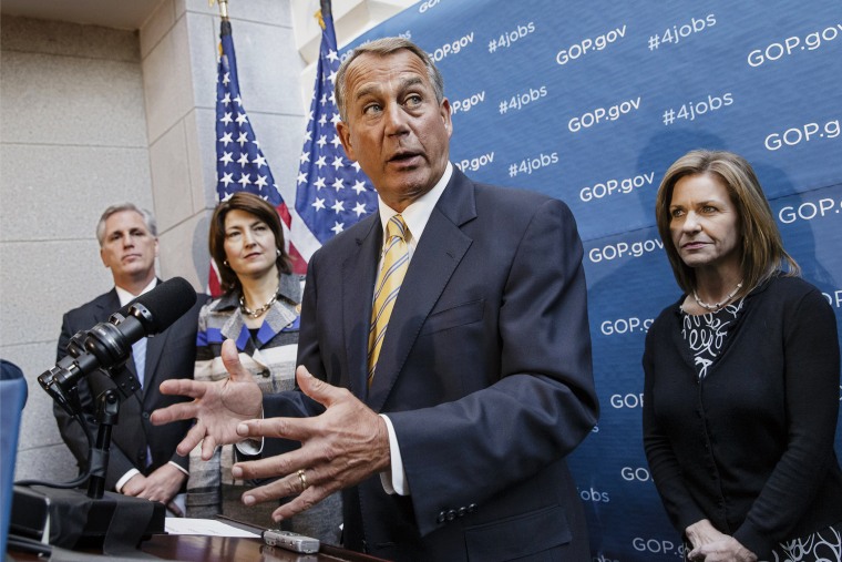 John Boehner meets with reporters on Capitol Hill, Jan. 8, 2014.