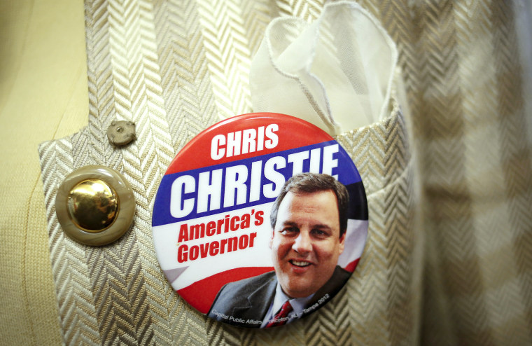 A supporter of New Jersey Governor Chris Christie wears a button during a campaign stop in Nutley Diner in Nutley, N.J. November 4, 2013.