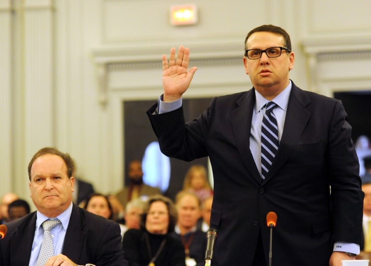 David Wildstein (R) former director of interstate capital projects for the Port Authority and his attorney Alan Zegas (L) is sworn in to testify at a hearing held by the Assembly Transportation Committee January 9, 2014 in Trenton, New Jersey.