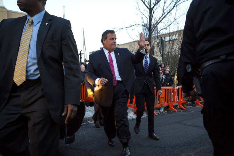 New Jersey Governor Chris Christie leaves city hall in Fort Lee, N.J. Jan. 9, 2014.