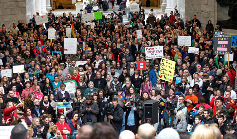 Supporters of gay marriage fill the rotunda as they gathered to rally at the Utah State Capitol Friday Jan. 10, 2014.