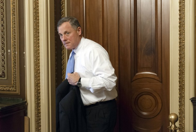 Sen. Richard Burr, R-N.C., leaves a closed-door GOP caucus luncheon at the Capitol in Washington, Tuesday, Jan. 14, 2014.