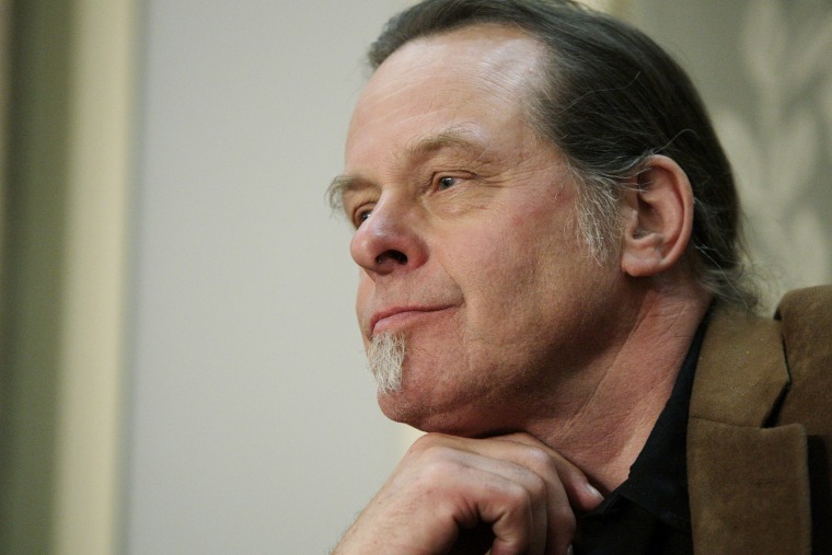 Musician Ted Nugent listens to U.S. President Barack Obama's State of the Union speech on Capitol Hill in Washington