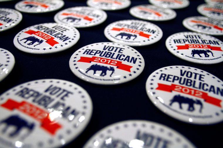 Buttons are displayed by a vendor at a Republican National Committee meeting, April 20, 2012 in Scottsdale, Arizona.