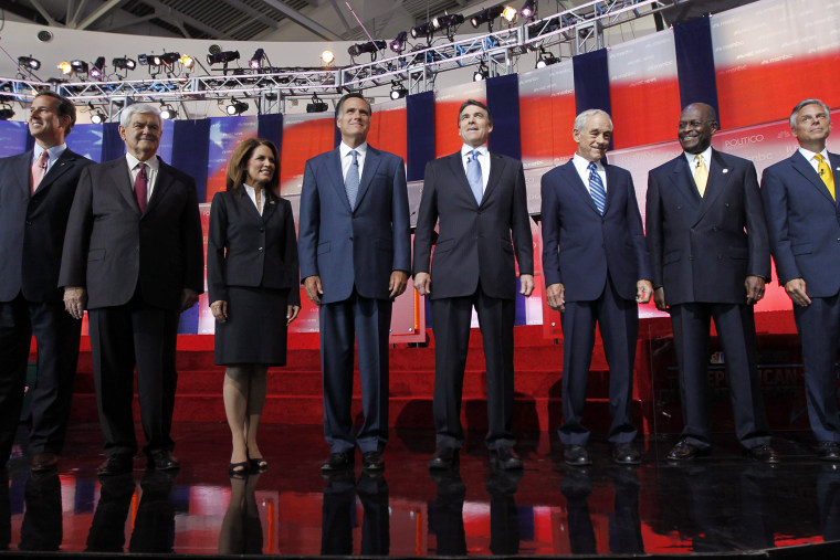Republican presidential candidates stand together before a Republican presidential candidate debate at the Reagan Library in Simi Valley, Calif on Sept 7, 2011.