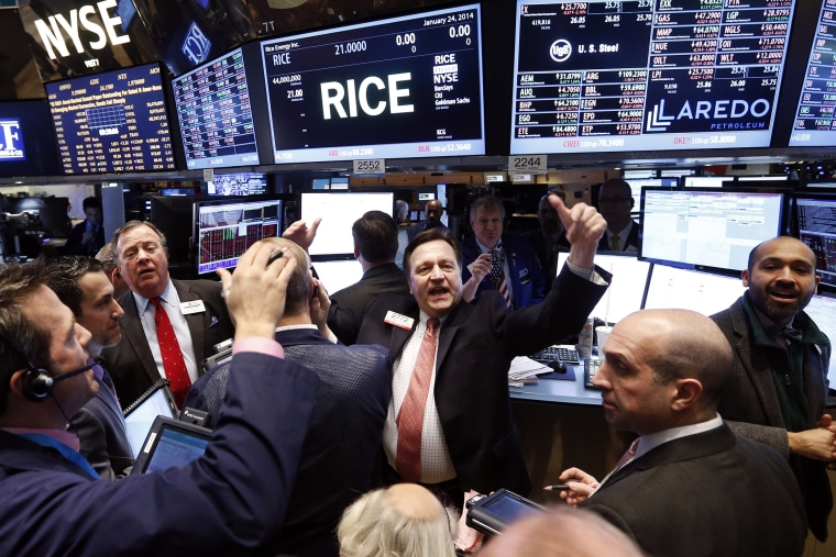 Traders work on the floor of the New York Stock Exchange Jan. 24, 2014.