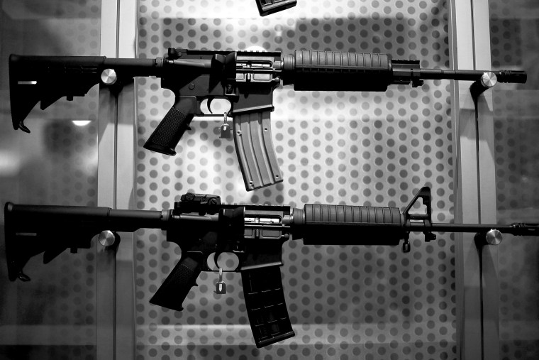 Assault rifles are displayed during the 2013 NRA Annual Meeting and Exhibits, May 4, 2013.
