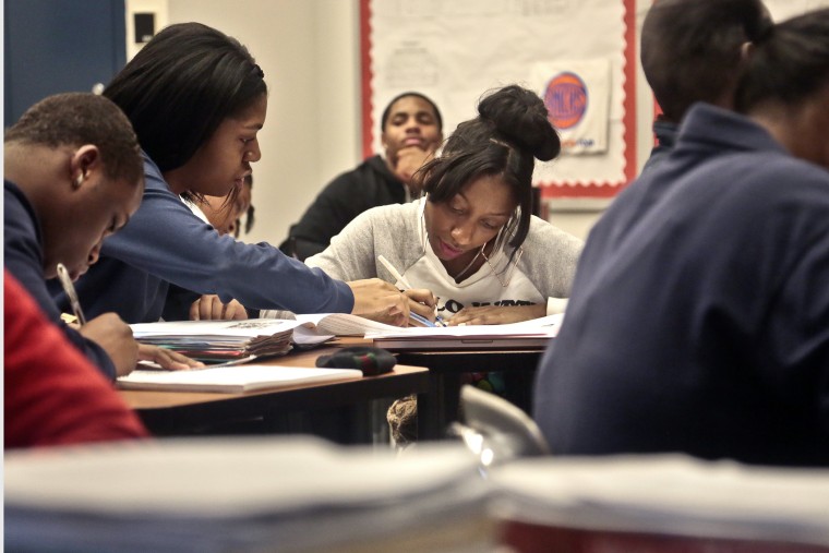 A Global Studies class of 10th and 11th graders work at Bedford Academy High School on Dec. 3, 2013 in New York City.