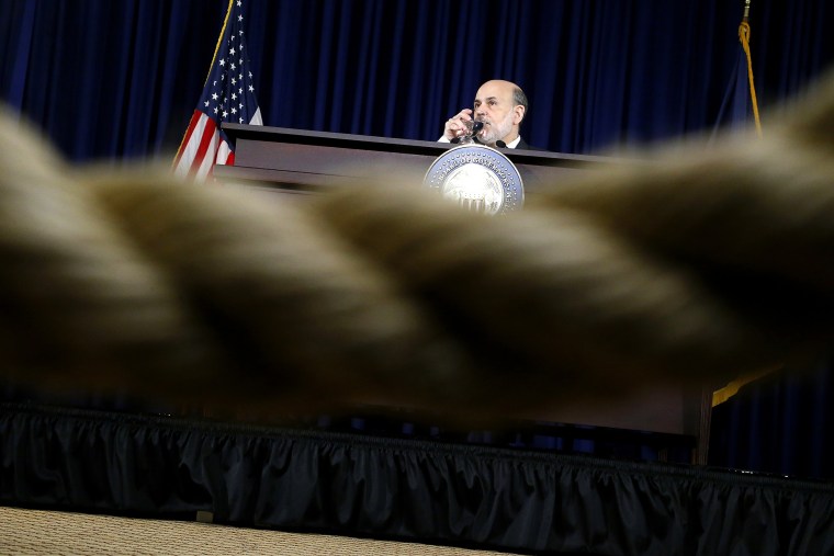 U.S. Federal Reserve Chairman Ben Bernanke during his final planned news conference before his retirement, at the Federal Reserve Bank headquarters in Washington, Dec. 18, 2013.