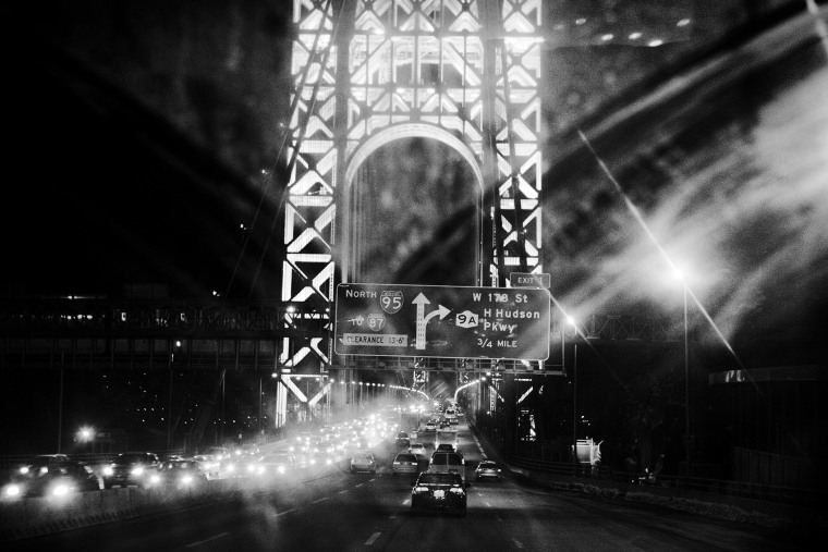 A night scene of the George Washington Bridge.