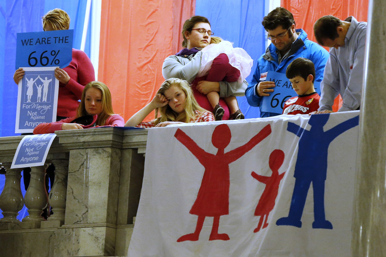 Demonstrators hold an anti-gay marriage rally inside the Utah State Capitol on Jan. 28, 2014.