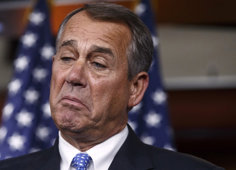House Speaker John Boehner of Ohio pauses while meeting with reporters on Capitol Hill in Washington, Thursday, Jan. 16, 2014.
