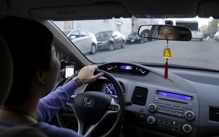 In this Jan. 4, 2013 photo,  Lyft driver Nancy Tcheou drives in San Francisco.