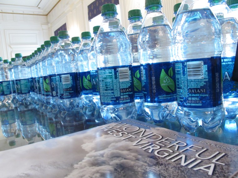 Bottles of water are lined up on a table in Gov. Earl Ray Tomblin's office on Friday, Jan. 10, 2014, in Charleston, W.Va. Residents are being told not to use...