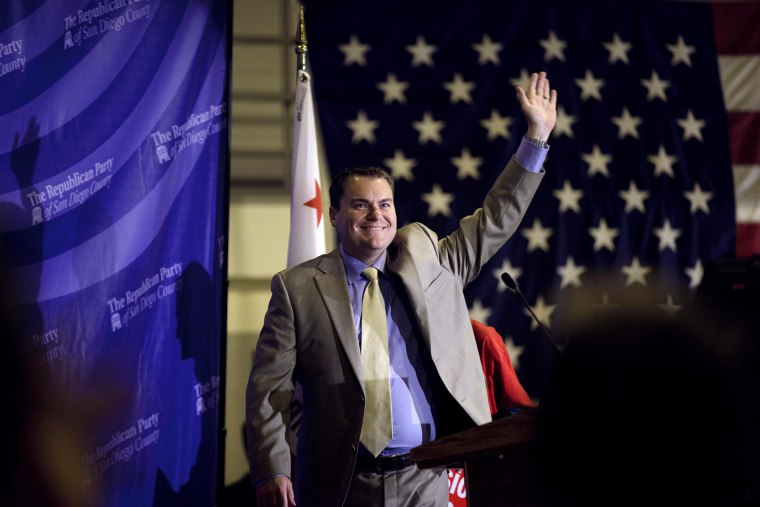 Carl DeMaio walks on stage during an event in La Jolla, Calif. on Sept. 7, 2011.
