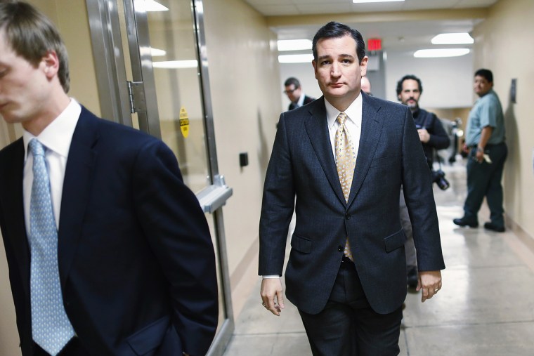 Ted Cruz walks to the Senate floor for a vote whether to raise the debt ceiling, Feb. 12, 2014.