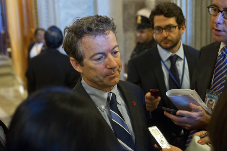 Sen. Rand Paul speaks to reporters at the Capitol, Sept. 25, 2013.