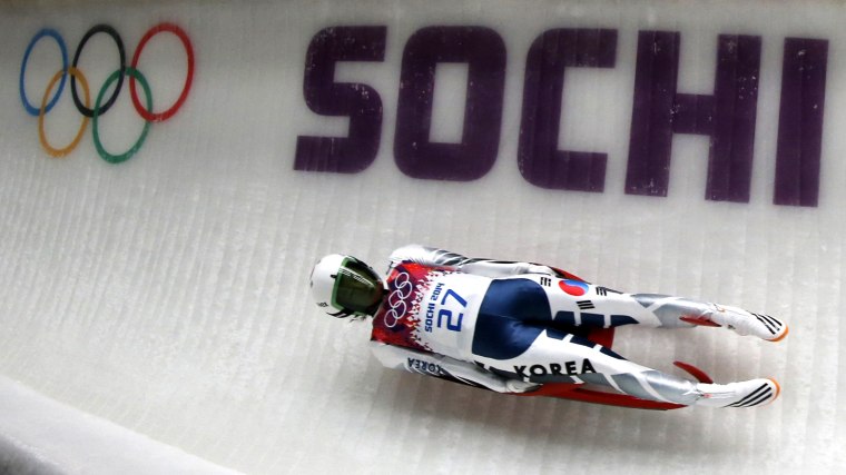 South Korea's Eunryung Sung speeds down the track during the women's singles luge event of the Sochi 2014 Winter Olympic Games, at the Sanki Sliding Center, Rosa Khutor Feb. 10, 2014.