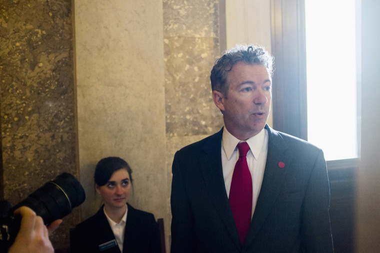 Senator Rand Paul arrives for the Republican weekly policy luncheon on Capitol Hill in Washington, jan. 28, 2014.