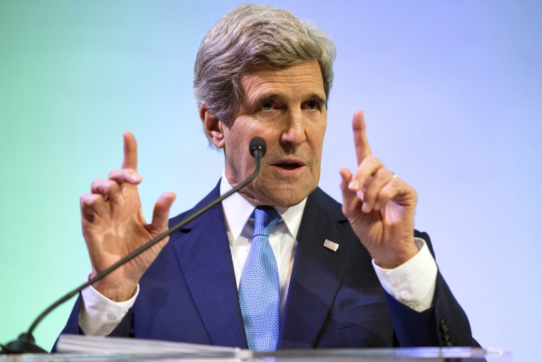 Secretary of State John Kerry gestures during a speech on climate change, Feb. 16, 2014.