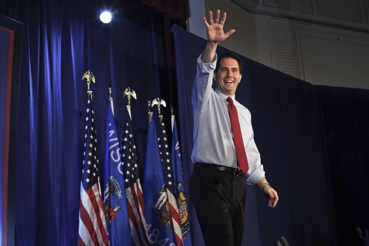 Wisconsin Governor Scott Walker greets supporters at an election-night rally in Waukesha, Wisconsin, June, 2012.