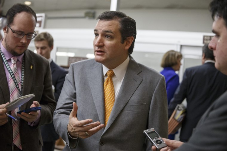 Sen. Ted Cruz, R-Texas speaks with reporters on Capitol Hill in Washington, Tuesday, Dec. 17, 2013.