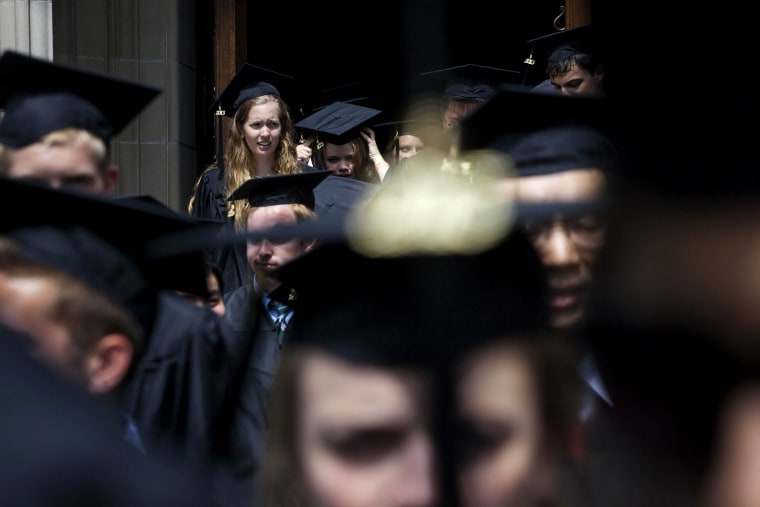 New graduates walk out of the chapel after their commencement at Princeton University in Princeton, New Jersey, U.S., on June 2, 2013.