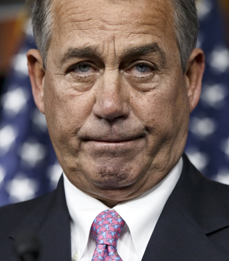 House Speaker John Boehner of Ohio pauses during a news conference on Capitol Hill in Washington, Thursday, February 6, 2014.