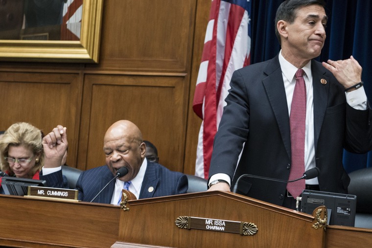 Committee chairman Rep. Darrell Issa (R-OH) (R) cuts ranking member Rep. Elijah Cummings (D-MD) off during a hearing of the House Oversight and Government Reform Committee on Capitol Hill on March 5, 2014 in Washington, DC.