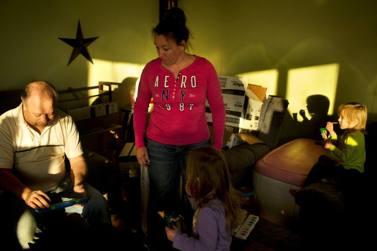 Paul and Kim Moody spend time with two of their daughters at their home in Ridgely, Maryland.