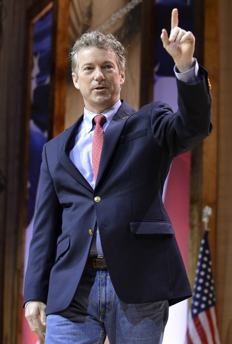 Image: Senator Rand Paul (R-KY) waves as he arrives onstage to deliver remarks at the Conservative Political Action Conference (CPAC) in Oxon Hill