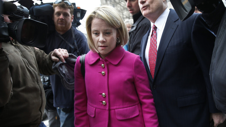 New Jersey Governor Chris Christie's former deputy chief of staff Bridget Anne Kelly makes her way through a crush of media with her attorney as she arrives at Mercer County Court in Trenton, New Jersey, March 11, 2014.