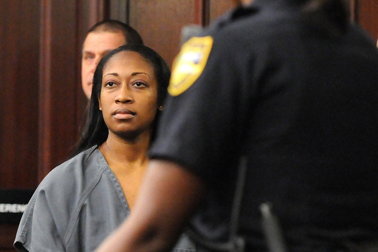 Marissa Alexander arrives in court on Thursday, October 31, 2013, at the Duval County Courthouse in Jacksonville, Fla.