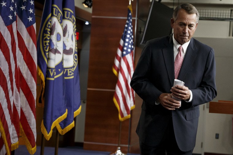 House Speaker John Boehner (R-OH) leaves a news conference on Capitol Hill in Washington, on March 13, 2014.r John Boehner of Ohio leaves a news conference on Capitol Hill in Washington, on March 13, 2014.