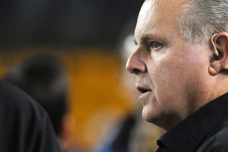 Rush Limbaugh looks on from the sideline before a National Football League game between the New England Patriots and Pittsburgh Steelers at Heinz Field on Nov. 14, 2010 in Pittsburgh, Penn.