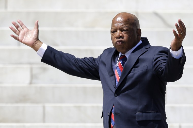 Rep. John Lewis, (D-GA) arrives to speak at a rally to commemorate the 50th anniversary of the 1963 March on Washington on the steps of the Lincoln Memorial on Aug. 24, 2013, in Washington.