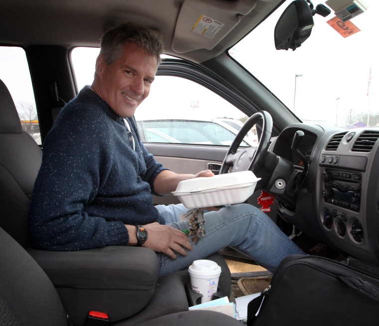 This photo taken March 22, 2014, shows former Massachusetts Sen. Scott Brown in his pick-up truck in Tilton, N.H.