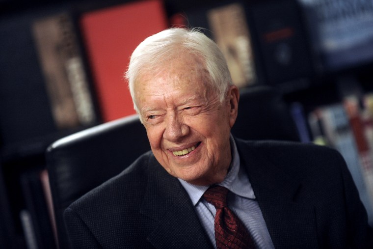 Former President Jimmy Carter signs copies of his new book 'A Call To Action Women, Religion, Violence, And Power' at Barnes & Noble, March 25, 2014 in New York, NY.