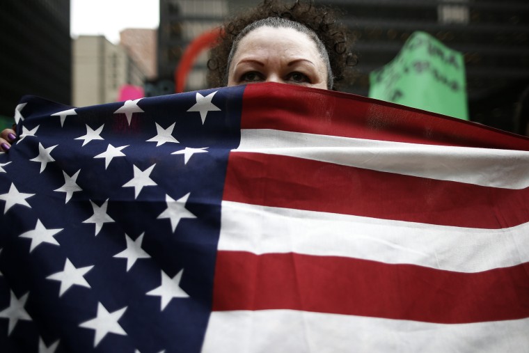 A protester takes part in a demonstration calling for immigration reform at a rally in Chicago, Ill. on March 27, 2014.