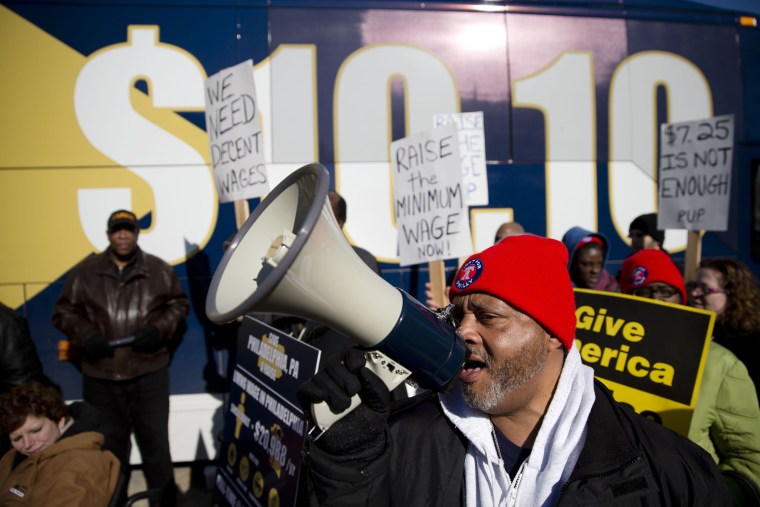 Protestors call for a minimum wage increase, Thursday, March 27, 2014, in Philadelphia.