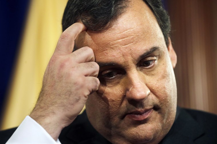 New Jersey Gov. Chris Christie pauses before answering a question Friday, March 28, 2014, in Trenton, N.J.