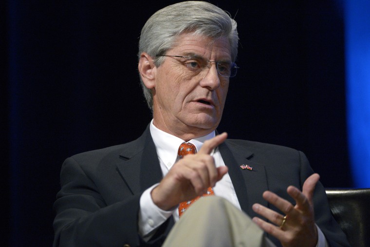 Mississippi Gov. Phil Bryant answers a question during a panel discussion in Orlando, Fla., Aug. 22, 2013.