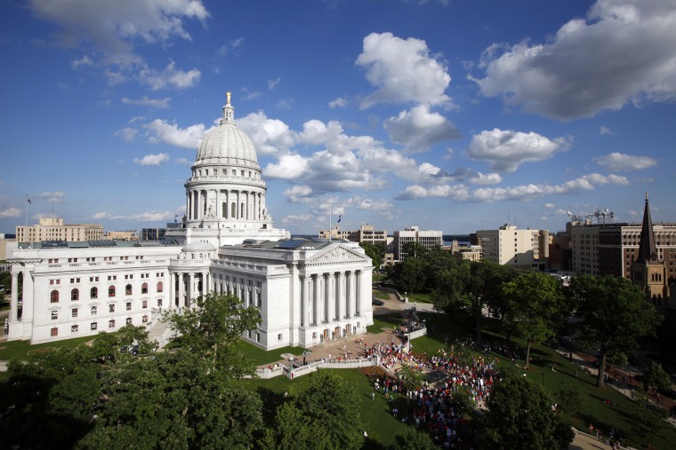 The Wisconsin State Capitol, as seen from a nearby building in Madison, Wis., on June 16, 2011.