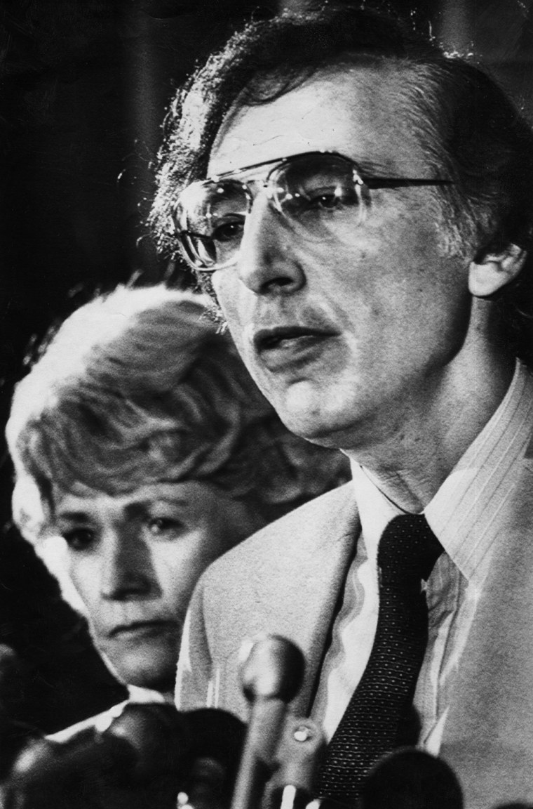 Dr. Robert Gallo, chief of the National Cancer Institute laboratory of Tumor Cell Biology, along with Health and Human Services secretary Margaret Heckler, face reporters in Washington on April 23, 1984 announcing that the probable cause of AIDS has been found.