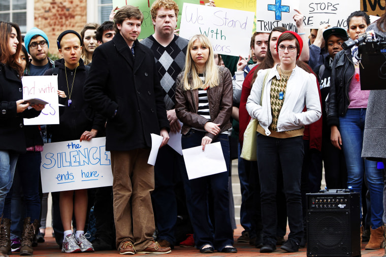 UNC-Chapel Hill students stand during a rally Friday March 1, 2013.