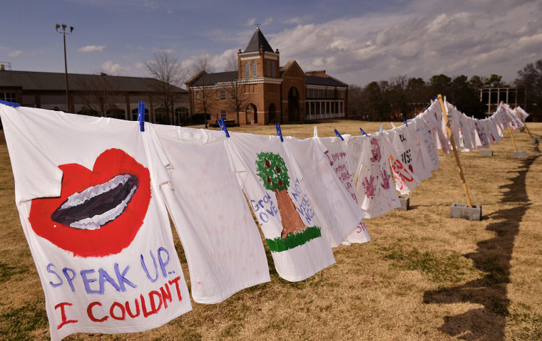 T-shirts display messages on the Clothesline Project at Converse College in  Spartanburg, S.C, on Feb. 20, 2014.