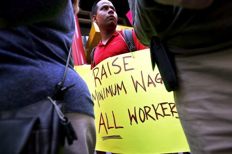 Low wage workers take part in a protest organized by the Coalition for a Real Minimum Wage in New York, May 30, 2013.