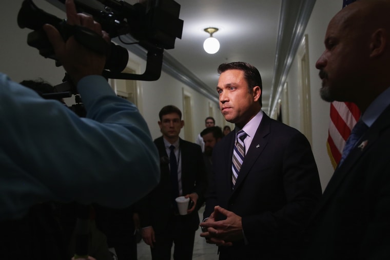Rep. Michael Grimm (R-NY) speaks to members of the media outside his office April 29, 2014 on Capitol Hill in Washington, DC.