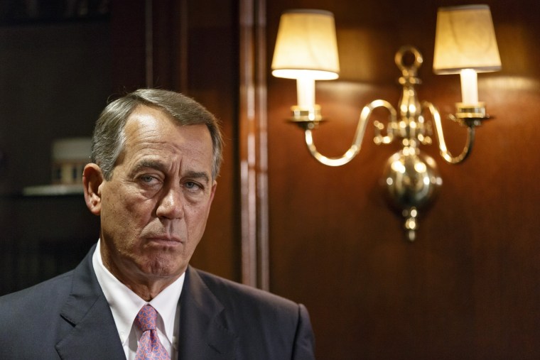 House Speaker John Boehner listens as GOP leaders speak to reporters following a Republican strategy meeting on Capitol Hill in Washington, Tuesday, April 29, 2014.